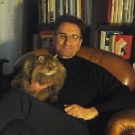 Shihan Roberto Di Blasio portret, with cat in his study.
