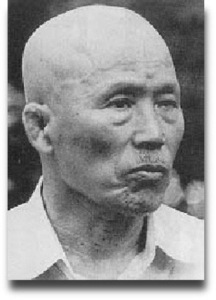 Portret Kenichi Saiwai, founder of Taikiken and skilled in martial arts like Iaido and Judo. 
